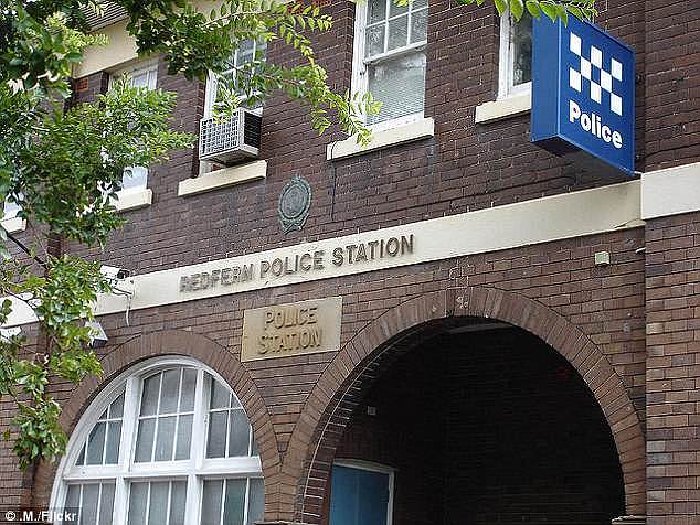 Police arrested a 21-year-old man at Redfern Police Station (pictured) about 1pm on Friday