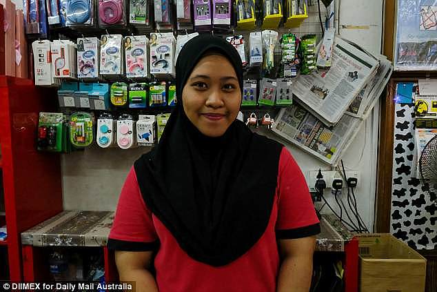 Shop worker Shakilu Ridzu (pictured) said via translator that the 'death penalty is good'