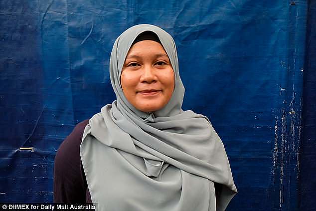 Shoe store worker 'Nur' speak to Mailonline during interview in Kuala Lumpur on May 26, 2018. Nur said she sometimes agrees, and sometimes disagrees with the death penalty