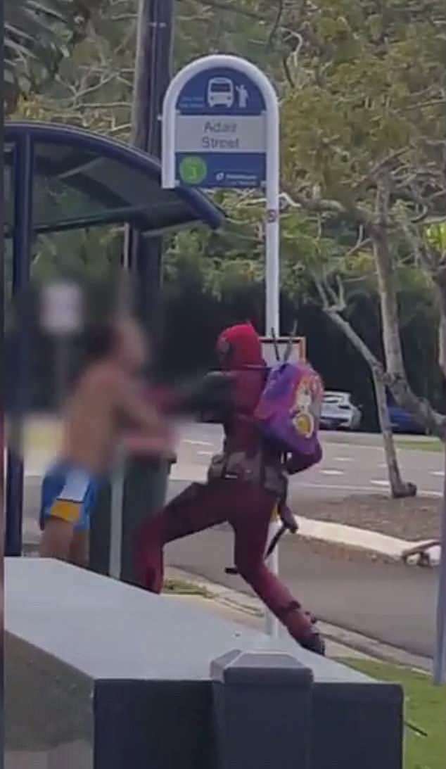 Cairn's very own Deadpool has been filmed in a violent altercation at a bus stop