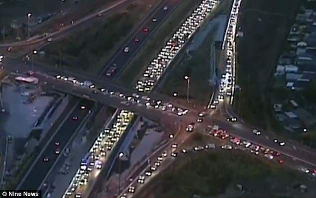 All eastbound lanes on Sydney's M4 motorway are closed after a multi-vehicle crash that has plunged peak-hour traffic into chaos