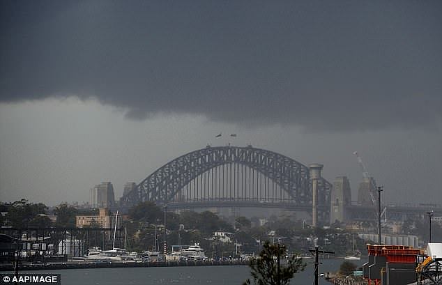 A thunderstorm is set to hit Sydney during the rush-hour commute with heavy rain and strong winds expected to lash the city