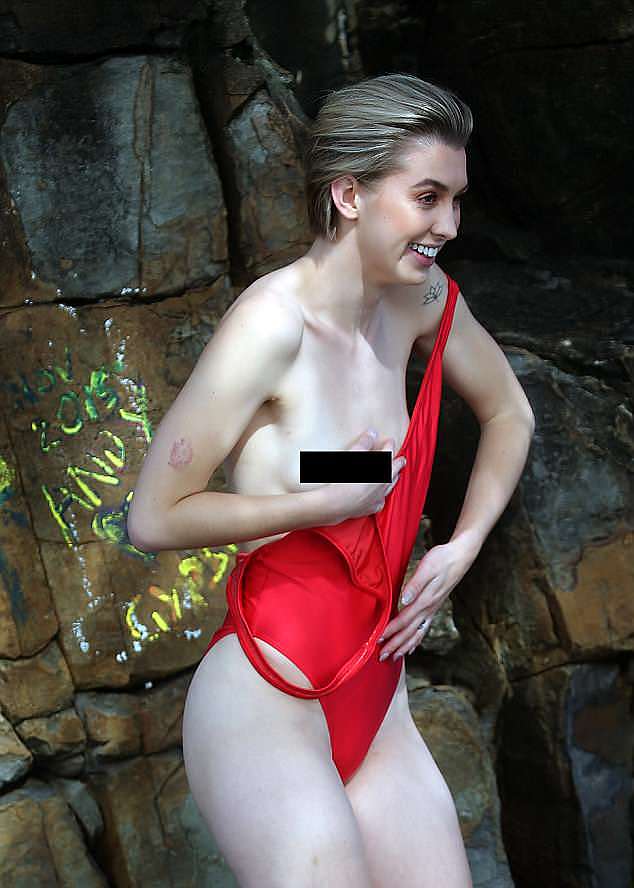 Look what happened by accident! While posing for the daring pictorial, Alex accidentally exposed her right breast while pulling down one of her swimsuit straps
