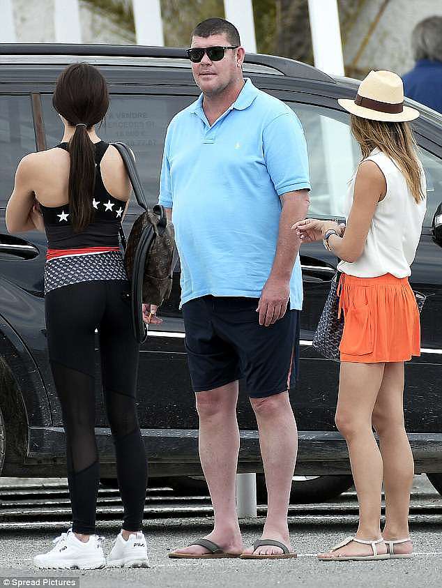 Stylish: Kylie looked slender in a pair of orange shorts, a sleeveless blouse and a Panama hat