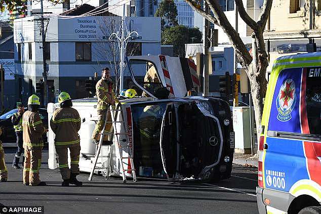 A Victorian Ambulance was flipped on its side following an accident in North Melbourne on Thursday morning 