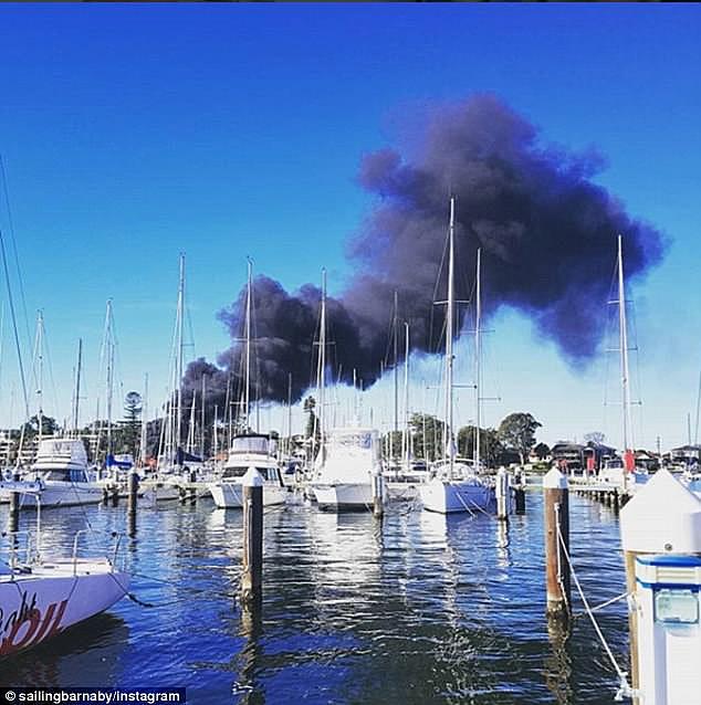 A man has been taken to hospital after a boat exploded and caught fire (pictured) in Belmont, New South Wales