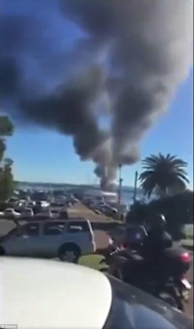 The thick black smoke rose into the sky and emergency services responded to the fire 