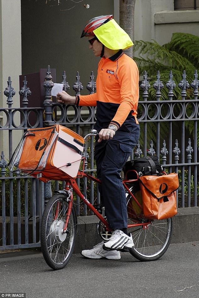 'What choice do you have?' A postie delivers the mail via pushbike on a footpath, above