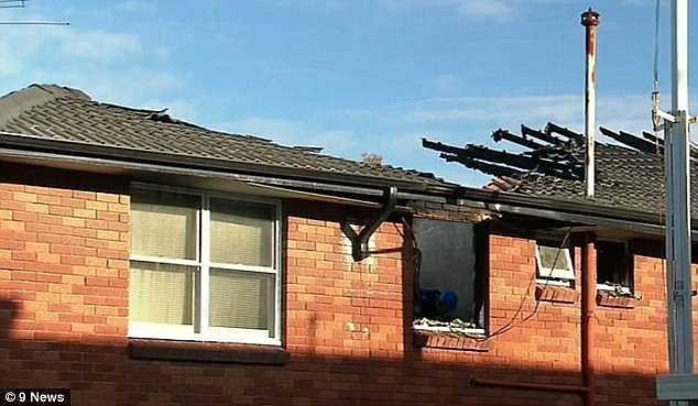 When they arrived, the roof of the two-storey building (pictured) was already well on it's way to completely collapsing, and Peter Eisler was still inside