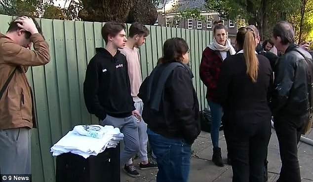 Tenants (pictured) were left out on the street after the blaze as emergency services attended to the units