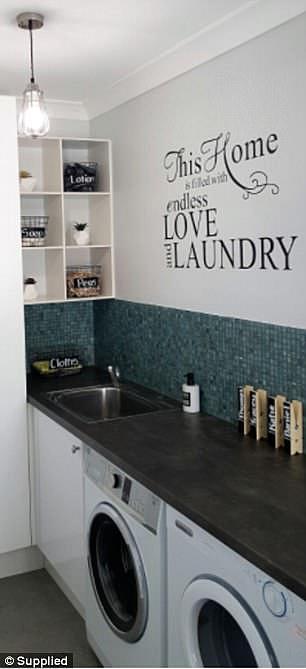 4DA445F800000578-5885455-Ms_O_Malley_s_pristine_laundry_room_which_she_tiled_with_mosaics-a-3_1530232619106.jpg,0