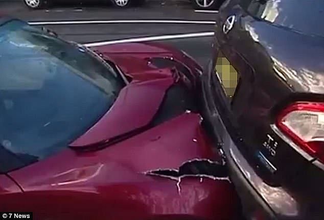 Pictures show the Lotus Elise was struck by another car from behind, causing it to slam into a car in front and trigger a domino effect (pictured)  