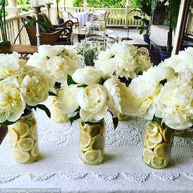 Lush: Earlier this year, Margot Robbie's wedding planner told Daily Mail Australia about her nuptials. Pictured are Margot's flowers with jars filled with lemons