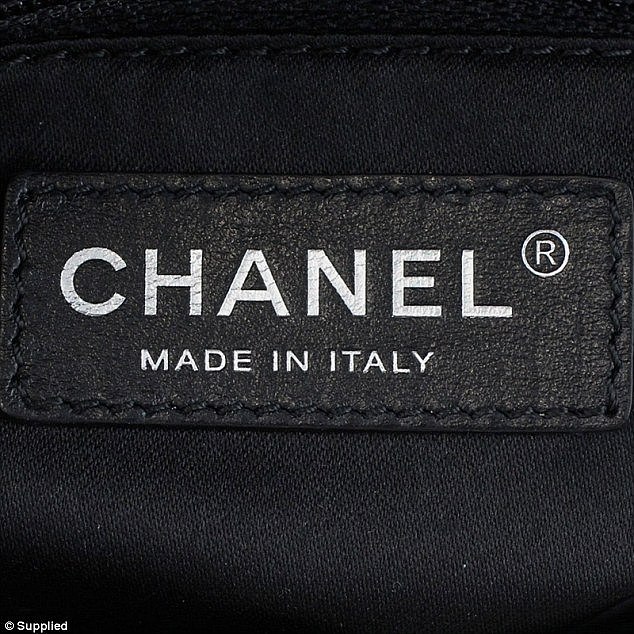 On the genuine Chanel bag (pictured) the letters of the 'MADE IN' stamp are very crisp, and are perfectly spaced and specifically positioned on the leather tab