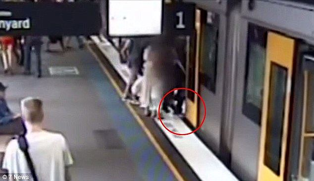 This terrifying footage of a child falling thought the gap between the platform and train (circled) at Circular Qua prompted a warning to parents from Sydney Trains