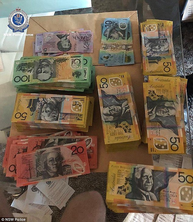 Almost 100-thousand dollars cash (pictured) was also seized during the alleged drug raid