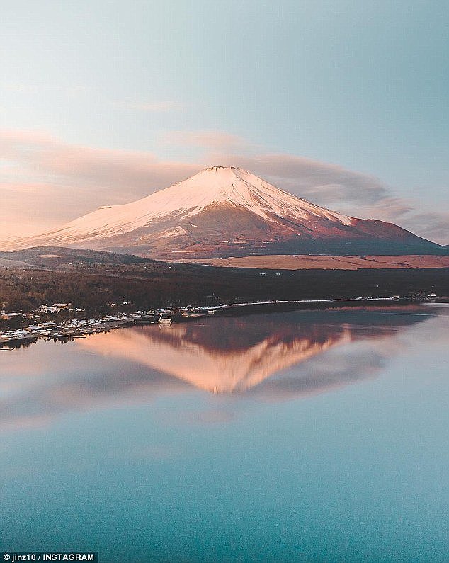 'It's such a safe destination…the volcanic action in Bali can put people off so they are trying somewhere different' - travel agents believe current affairs and global geographical events are contributing to the surge in demand for Japan (sunrise over Mount Fuji, pictured)