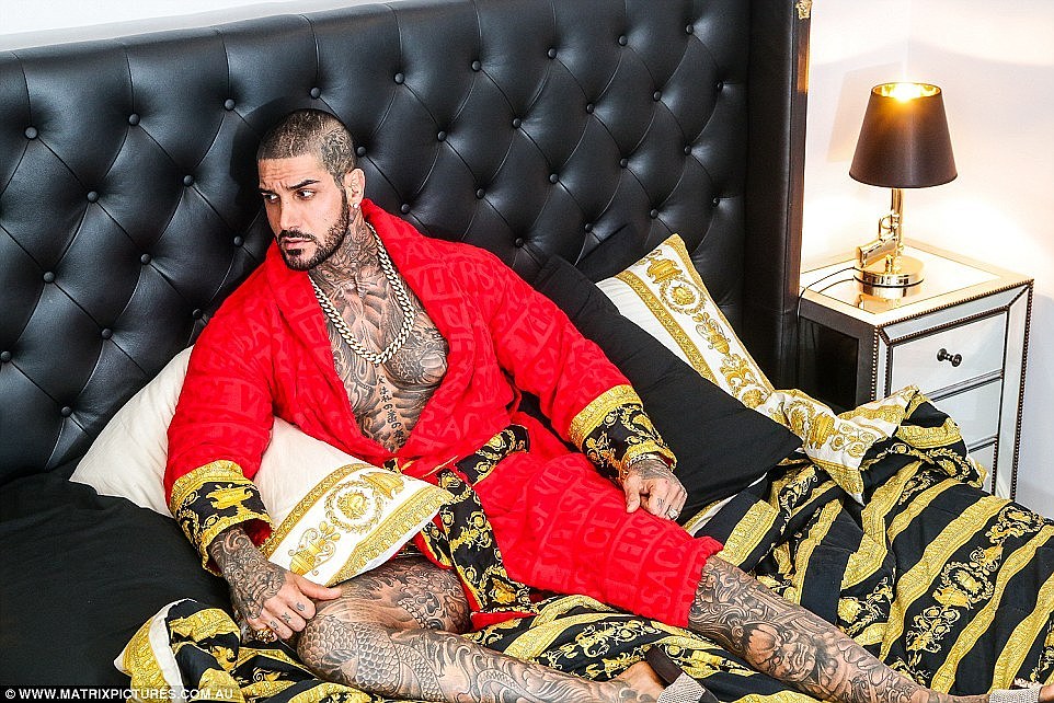 'I'm the Lamborghini', Yakiboy said. He strikes a pose wrapped in his favourite Versace smoking jacket and bedsheets above
