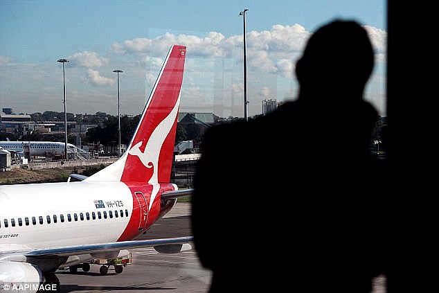 A flight attendant has been sacked by Qantas over a $20,000 trip to hospital after too many peach martinis 