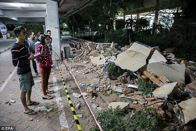 Parts of a shopping mall building collapsed after the earthquake was felt in Denpasar, Bali