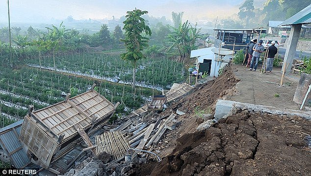 Pictured: Damage caused by last week's quake which killed 16 people on the Indonesian island