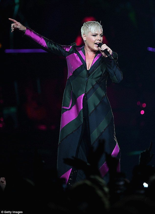 How disappointing! Pink has postponed her third Sydney show on Tuesday after being rushed to hospital and diagnosed with a gastric virus. Pictured performing in Melbourne on July 16