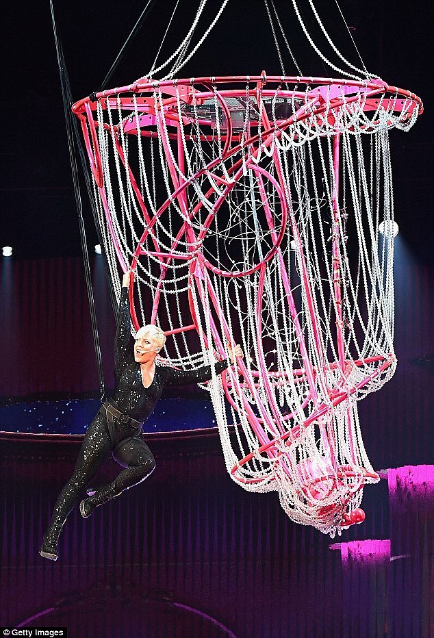 Demanding routine: Pink is pictured performing at Rod Laver Arena in Melbourne on July 16