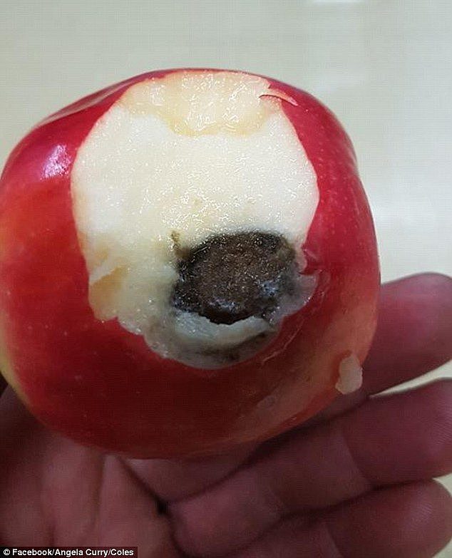 One customer complained to Coles about her apple (pictured) being contaminated