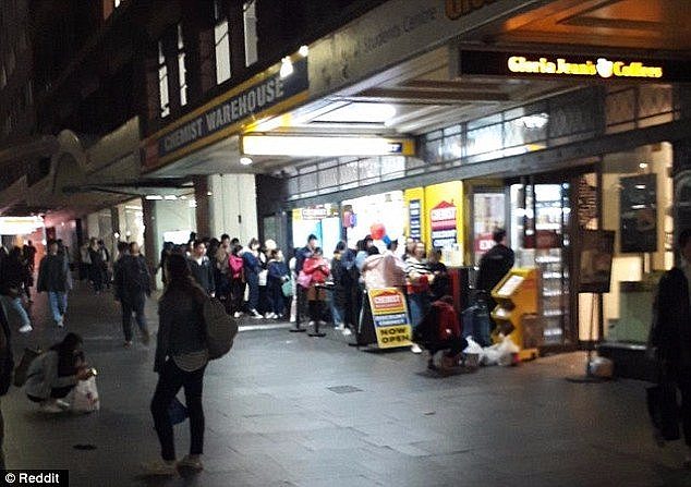 Dozens of shoppers could be seen queuing outside a Chemist Warehouse in central  in a photo uploaded to Reddit yesterday, many of whom are there to buy vitamins and baby formula in the hope of reselling them to  at a profit