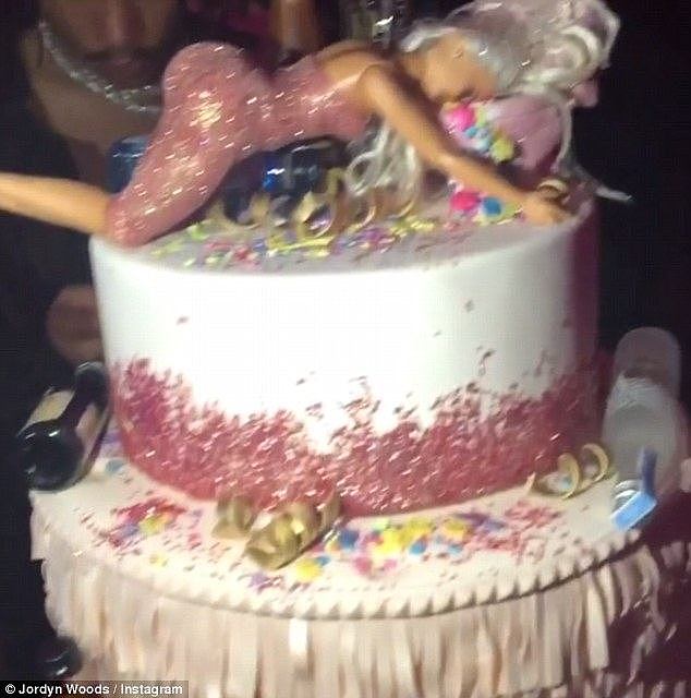 Kylie's birthday cake saw a drunken Barbie version of her on top of the cake, wearing the exact same outfit