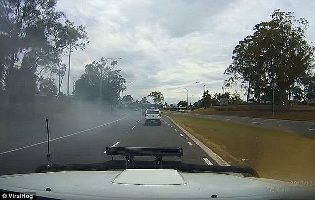 The dashcam footage was captured along a motorway in Camden New South Wales. The white car appears to vanish in a cloud of smoke