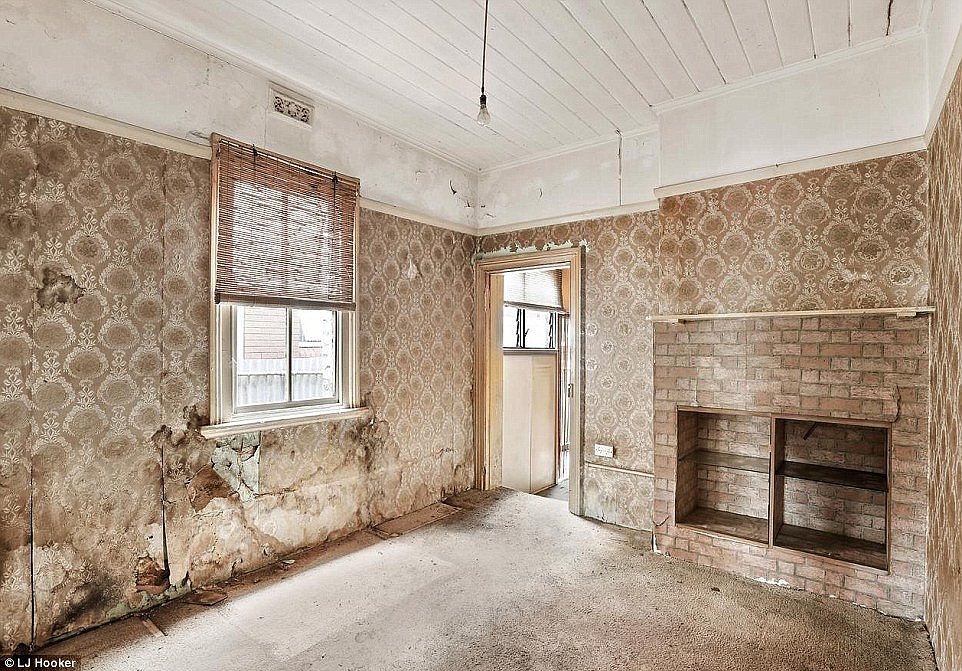 An Erskineville property with uneven floors and ripped wallpaper is expected to go for around $1million at auction (Pictured 68 Charles St)