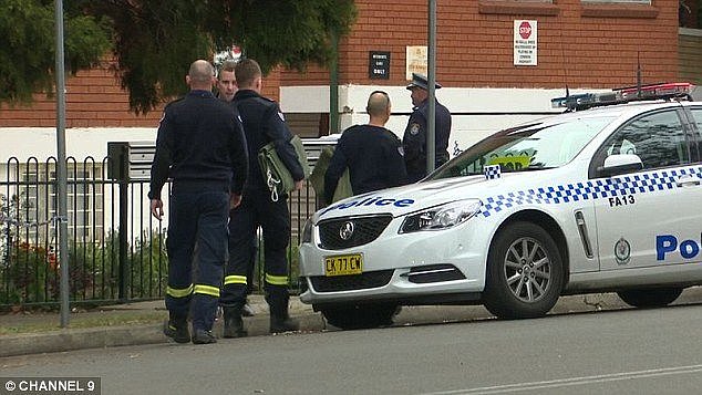 Police (pictured) arrested a man at the scene following a short pursuit in Sydney's southwest