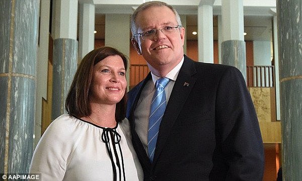 4F8E711200000578-6117963-Scott_Morrison_pictured_with_wife_Jenny_has_refused_to_comment_o-m-19_1535710973770.jpg,0