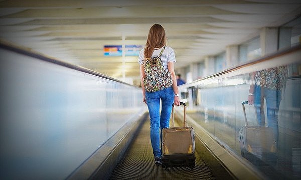 1200-woman-walking-at-airport.jpg,0