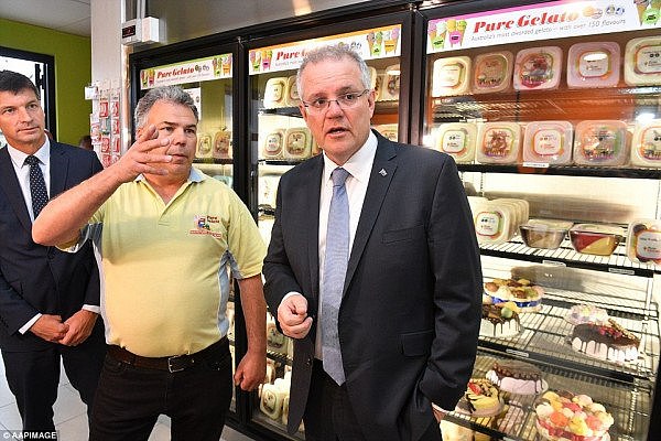 5194684200000578-6309971-Prime_Minister_Scott_Morrison_right_appeared_to_be_a_lot_slimmer-a-2_1540437470094.jpg,0