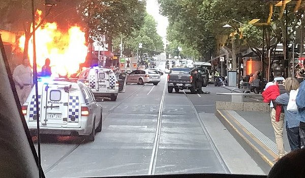 5968198-6370669-A_car_has_crashed_on_Melbourne_s_Bourke_Street_Mall_and_burst_in-a-64_1541746459597.jpg,0