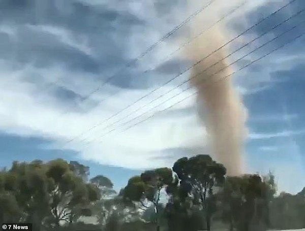 7029690-6462081-A_dust_devil_pictured_recorded_in_Two_Wells_north_of_Adelaide_on-m-1_1543999303726.jpg,0