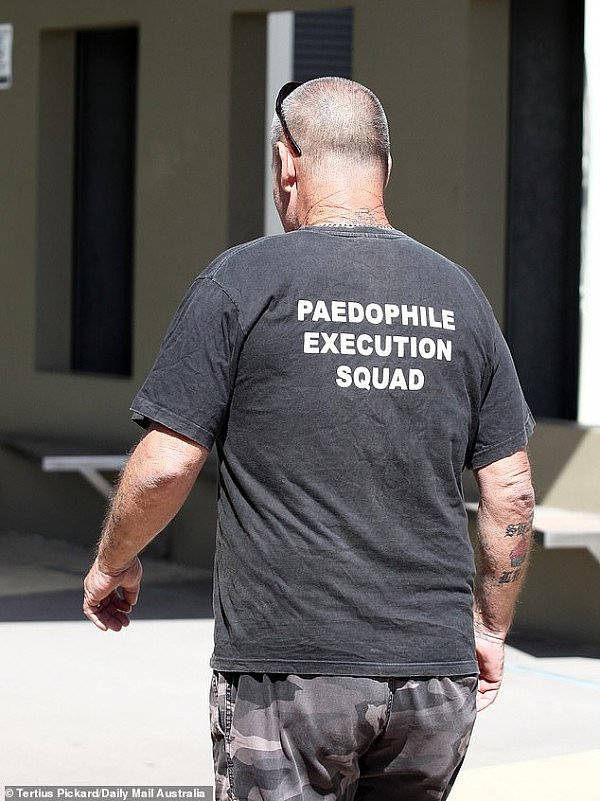 7313686-6486049-He_wore_a_tshirt_with_paedophile_execution_squad_written_across_-a-4_1544584818342.jpg,0