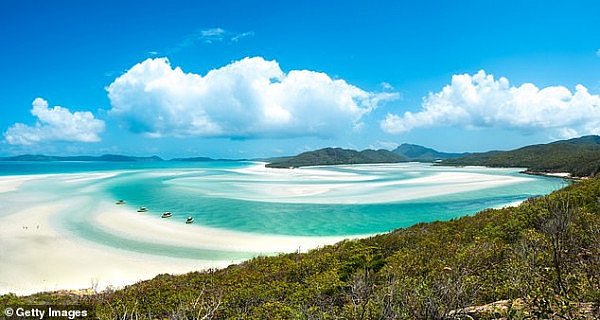 10299920-6746121-The_Whitehaven_Beach_is_a_7km_stretch_of_pure_perfection_located-a-42_1551178423544.jpg,0