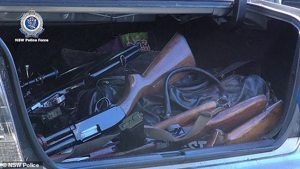 14827704-7144957-Police_recovered_29_guns_in_a_deserted_car_in_Bankstown_south_we-a-1_1560641215649.jpg,0