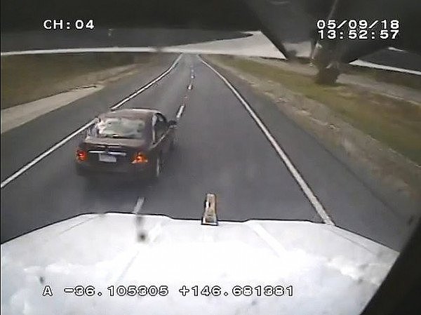 15257026-7181657-Dashcam_footage_from_the_truck_showed_the_ensuing_dangerous_driv-a-1_1561515649407.jpg,0