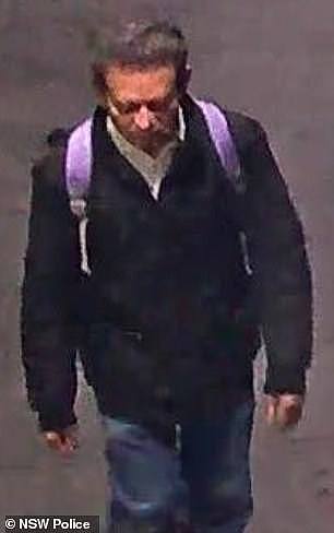 17425350-7369879-Police_have_released_CCTV_images_of_a_man_pictured_they_believe_-a-2_1566173888396.jpg,0