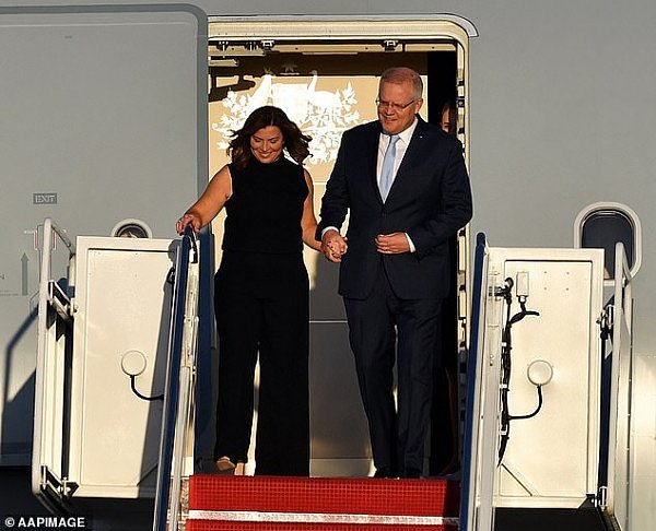 18707554-7484483-Prime_Minister_Scott_Morrison_s_wife_has_stepped_out_in_the_Unit-m-25_1568964098333.jpg,0