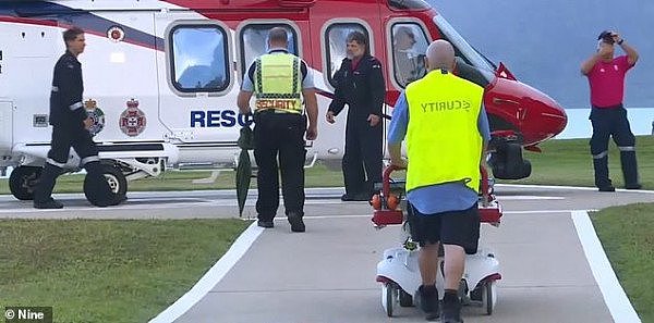 20039356-7600763-She_was_flown_by_rescue_helicopter_pictured_to_Cairns_Base_Hospi-a-1_1571779722107.jpg,0