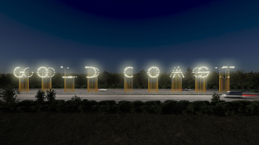 艺术家对夜间汽车驶过时在 M1 旁边拼出“黄金海岸”的灯光装置的印象