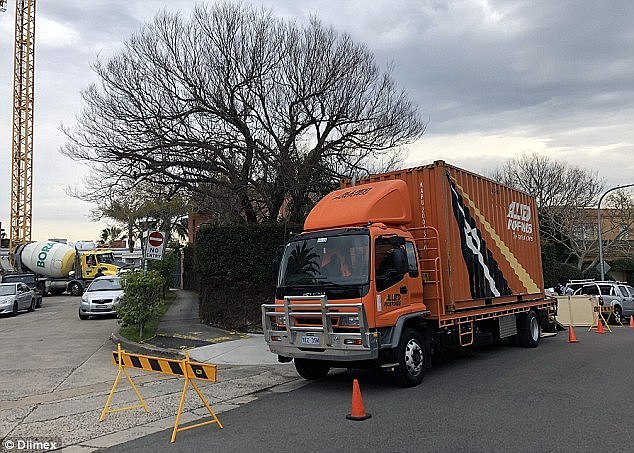The removal van blocked off part of the Point Piper street the Turnbull's call homeÂ 