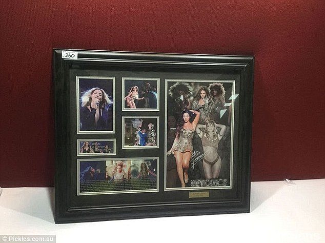 A big fan: A framed Beyonce photograph will go to her biggest fan- unfortunately it isn't signed