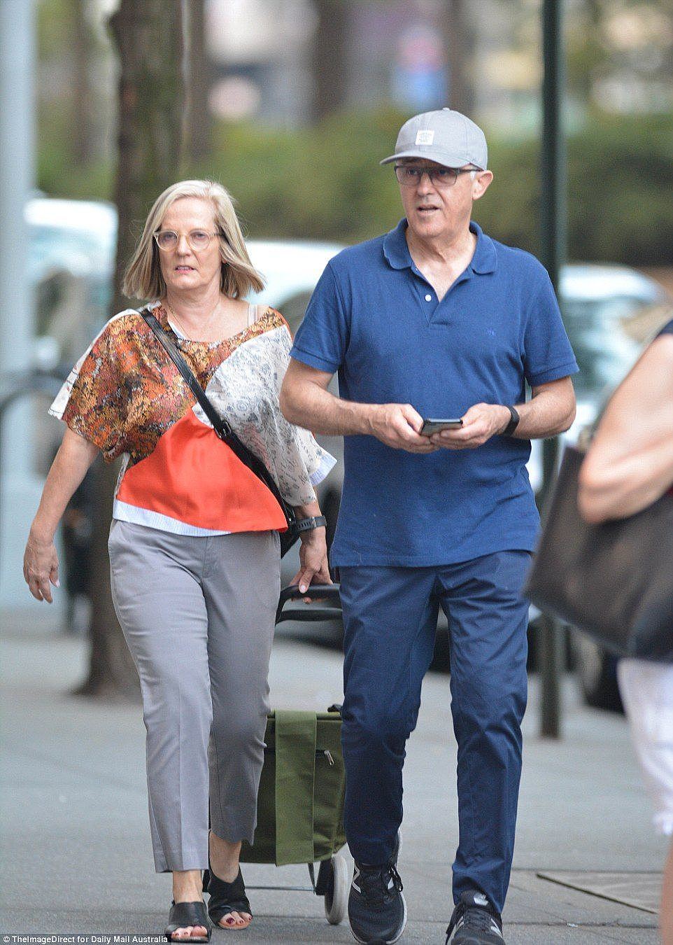 Multi-millionaire former prime minister Malcolm Turnbull and his wife Lucy have been spotted trundling a green trolley around New York City as the party he left behind is beset with claims of bullying, leaks and scandal