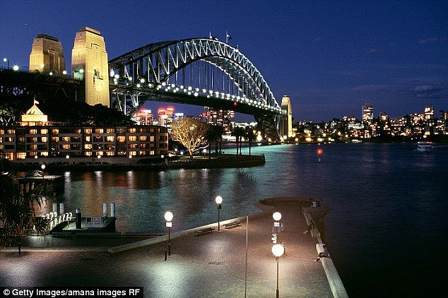 The woman was seen jumping into the water near the Overseas Passenger Terminal in The Rocks (pictured)Â 